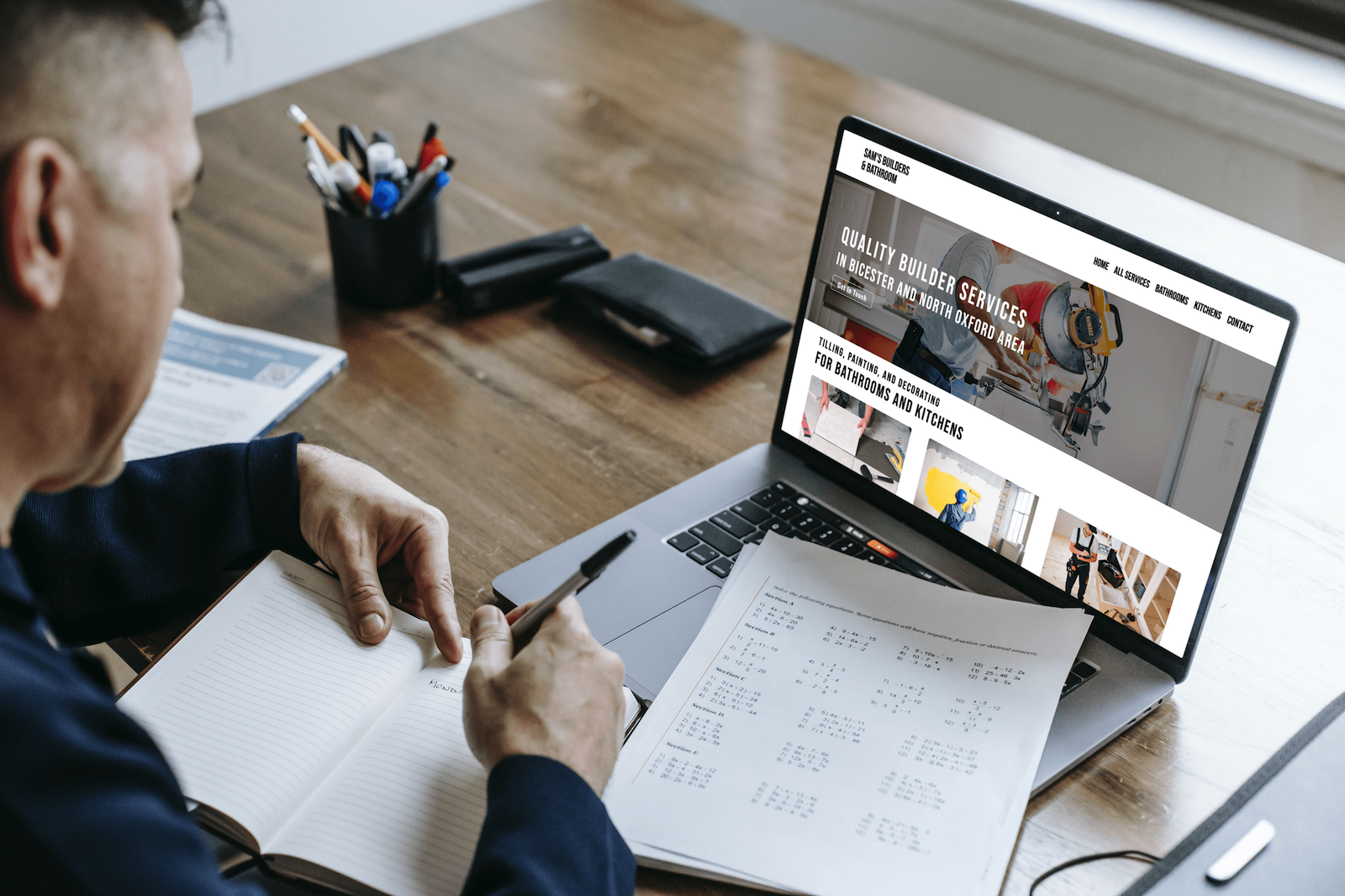 Sams builders on laptop.